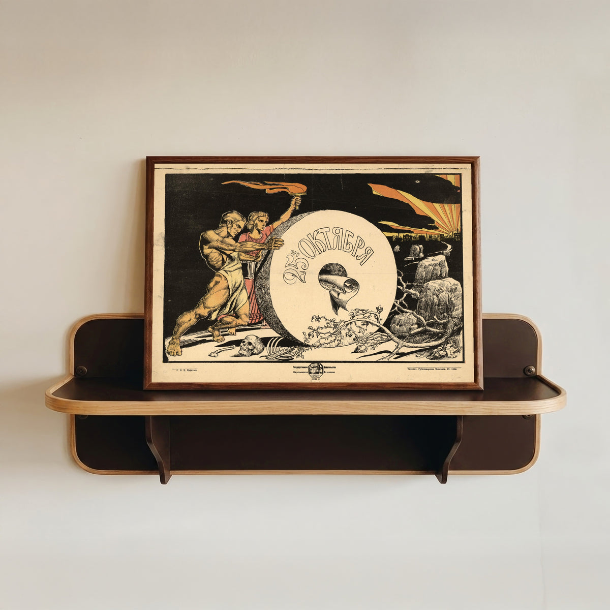Framed art print of 25th of October, in a dark wood frame resting on a wall shelf
