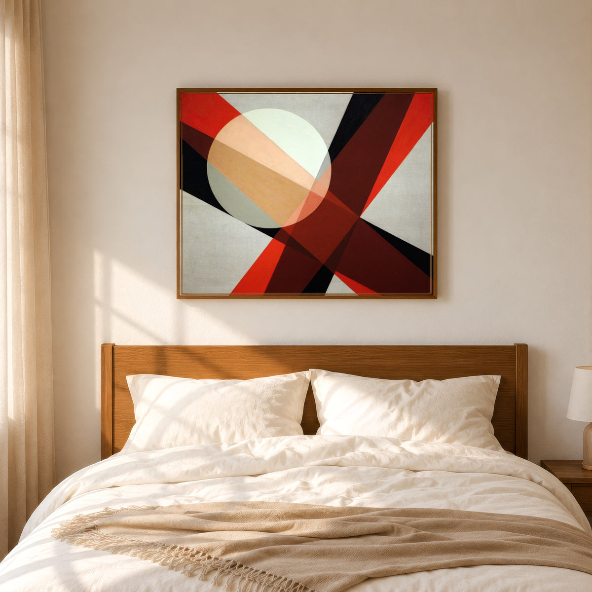 Framed art print of A 19 by László Moholy-Nagy, in a slim wood frame above a bed in a sunlit bedroom