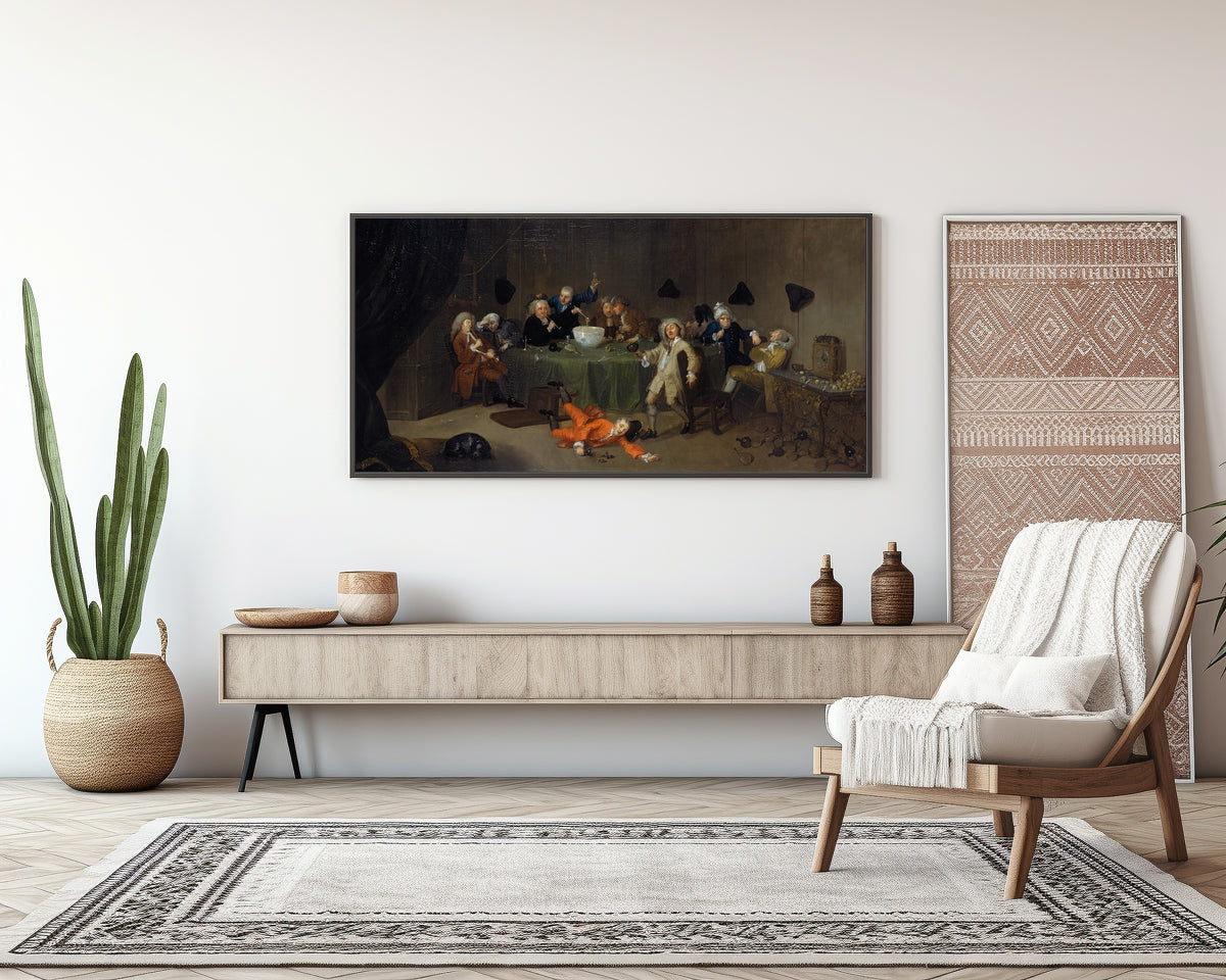 Framed art print of A Midnight Modern Conversation by William Hogarth, above a sideboard in a living room