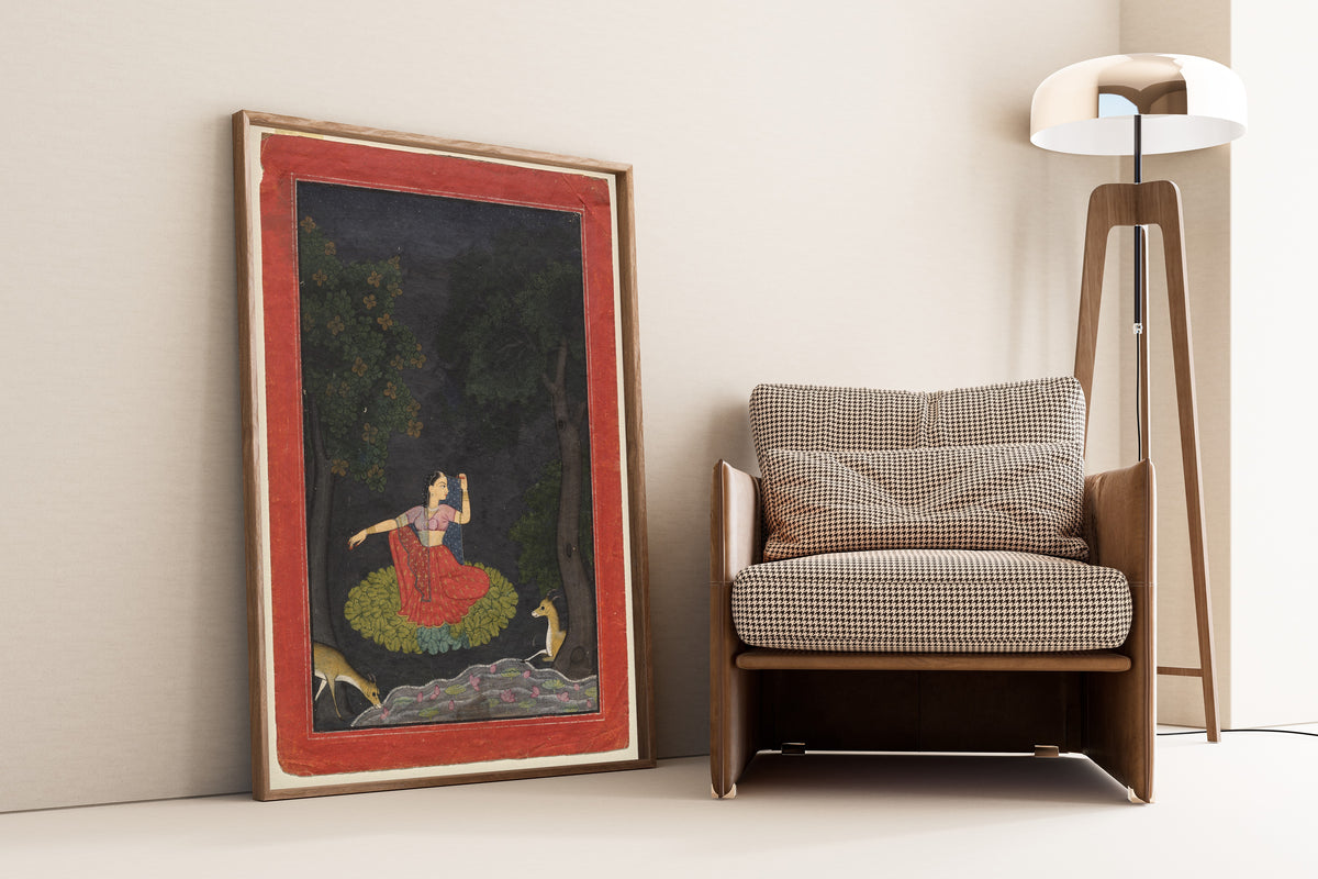 Framed art print of A heroine waiting for her lover: Vasakasajja Nayika by Pahari school, leaning against a wall beside an armchair and a floor lamp