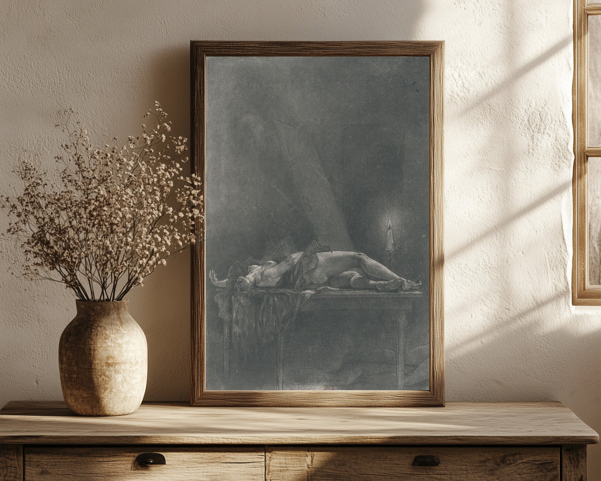 Framed art print of A un dîner d'athées (2nd state) by Félicien Rops, in a dark wood frame leaning on a rustic console beside dried flowers
