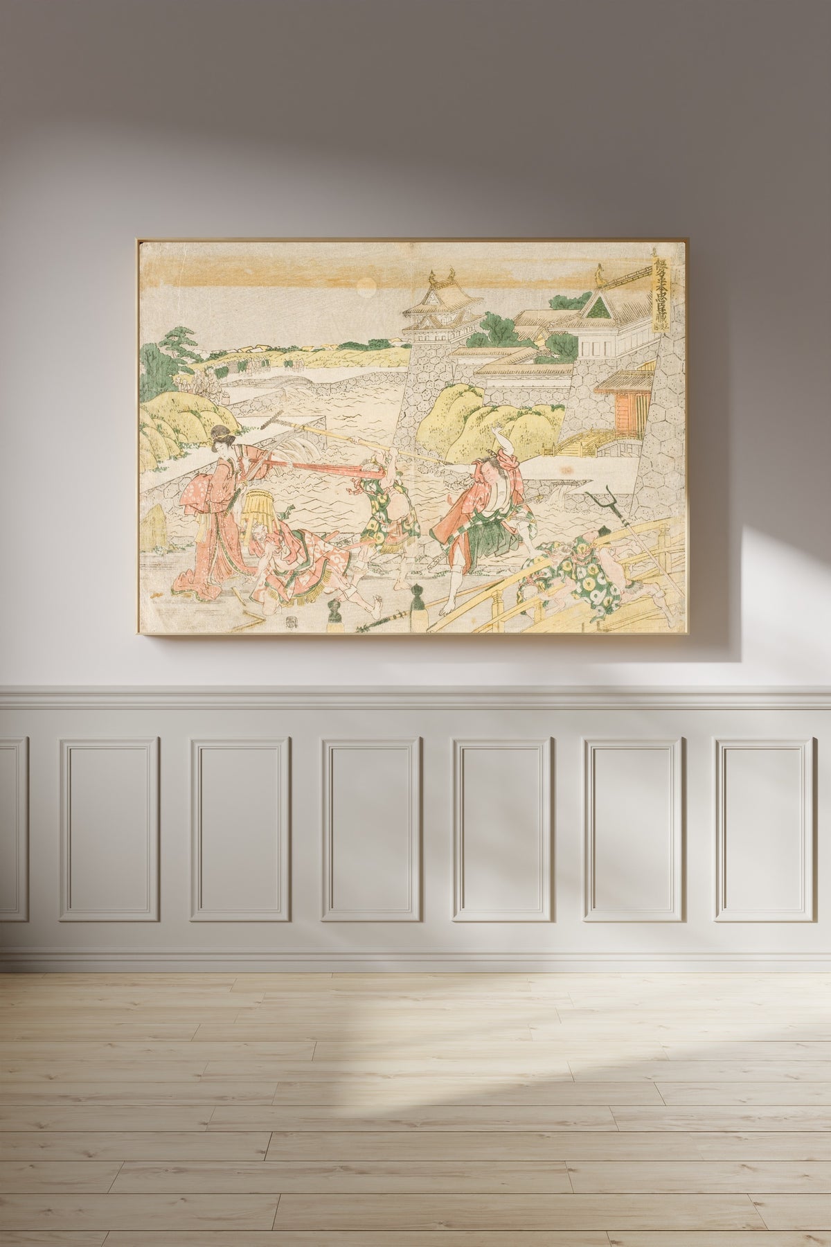 Framed art print of Act III from the Play Kanadehon Chūshingura by Katsushika Hokusai, on a panelled wall in afternoon light