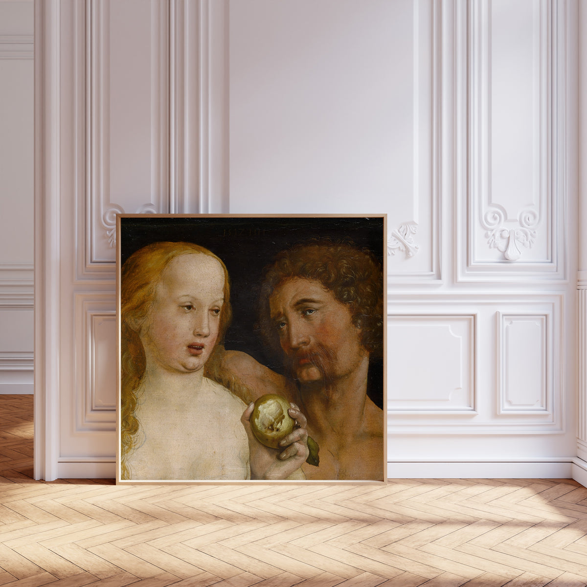 Framed art print of Adam and Eve by Hans Holbein the Younger, leaning against pale pink panelling on a herringbone floor