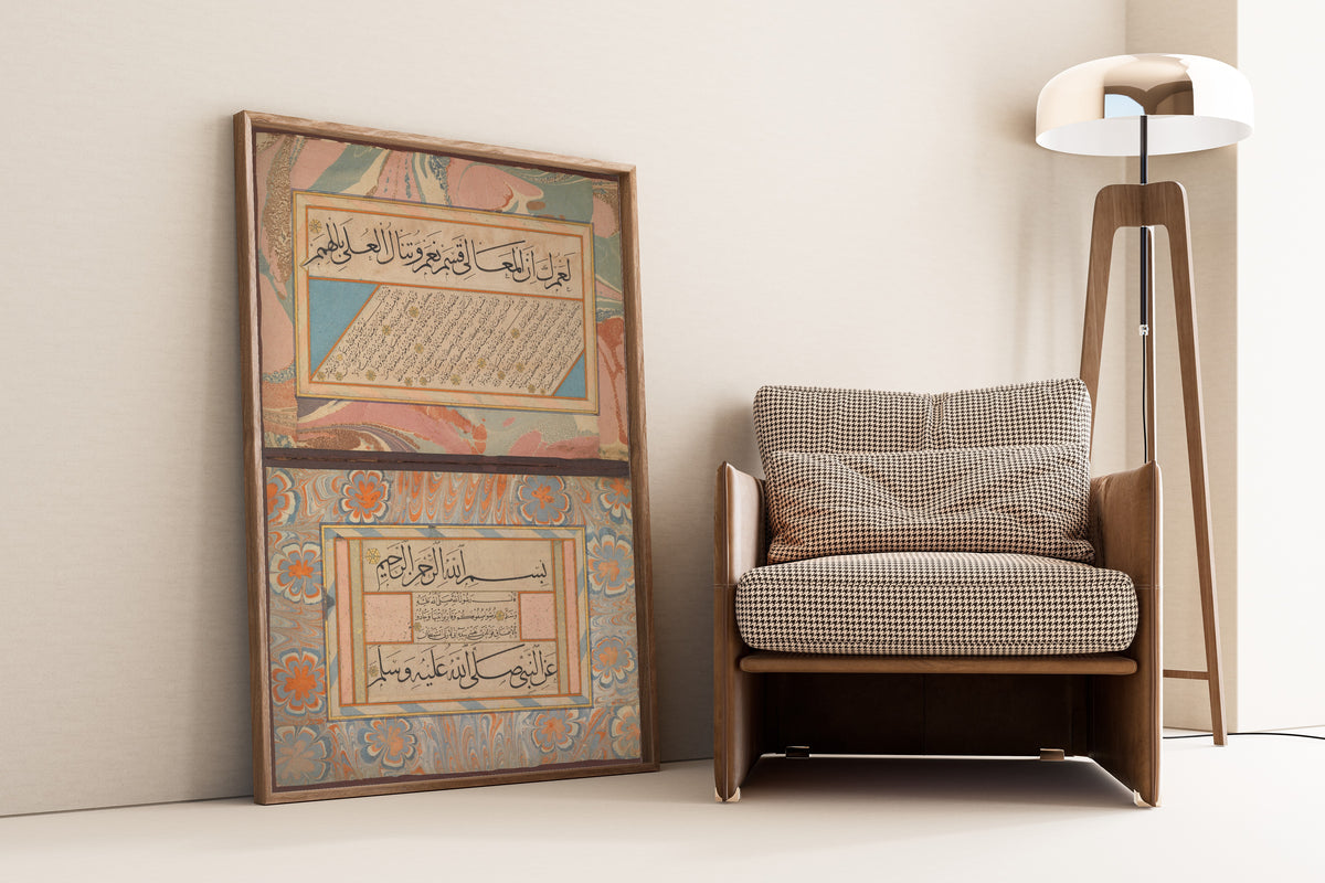 Framed art print of Album of Calligraphies Including Poetry… by Shaikh Hamdullah ibn Mustafa Dede, leaning against a wall beside an armchair and a floor lamp