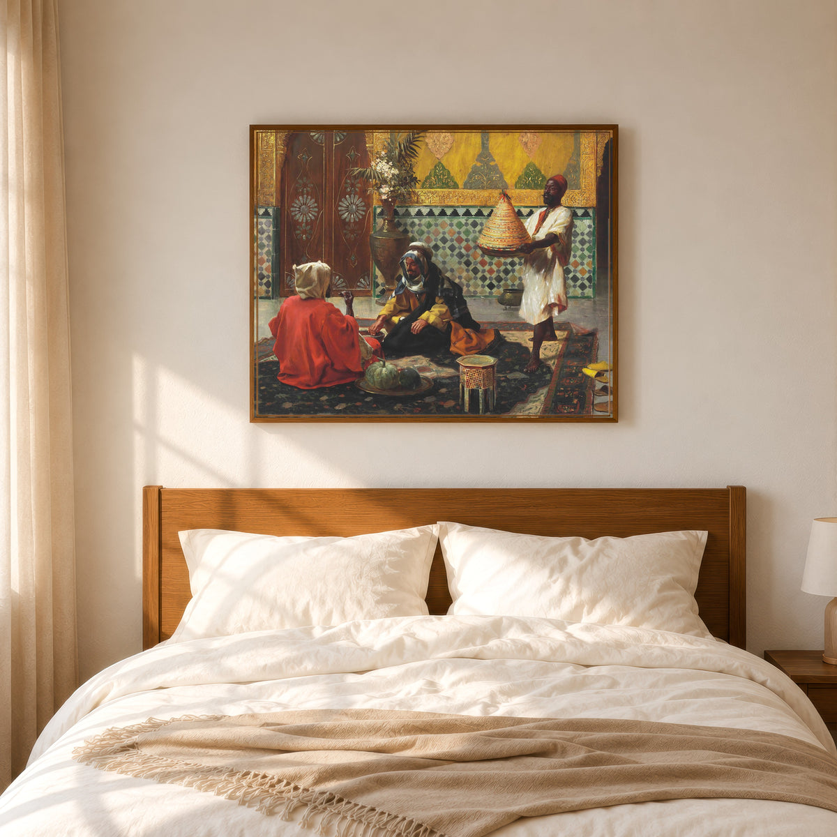 Framed art print of An Afternoon Discussion by Rudolf Ernst, in a slim wood frame above a bed in a sunlit bedroom