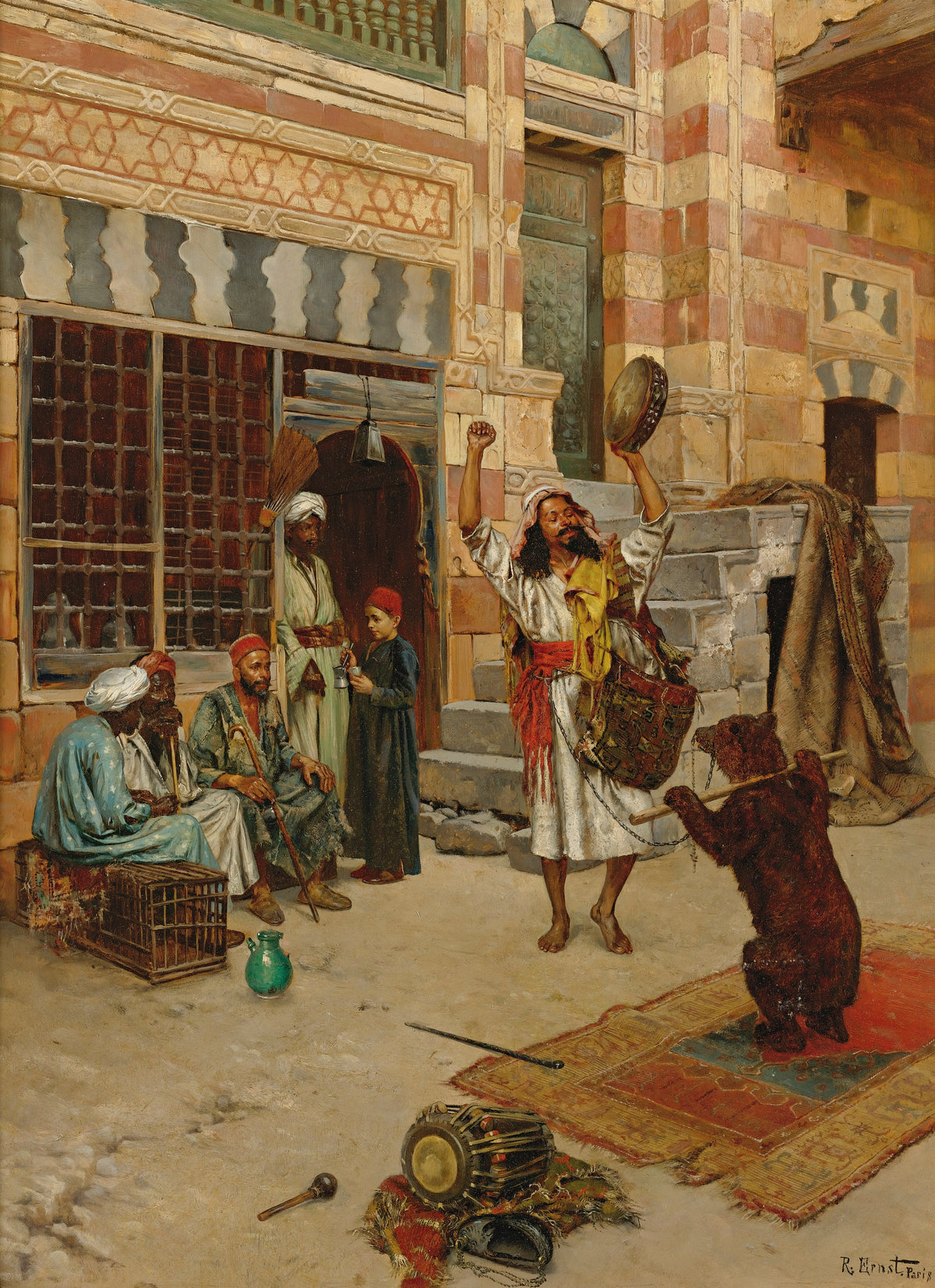 An Afternoon Show by Rudolf Ernst — A showman shakes a tambourine as a brown bear rises on a carpet