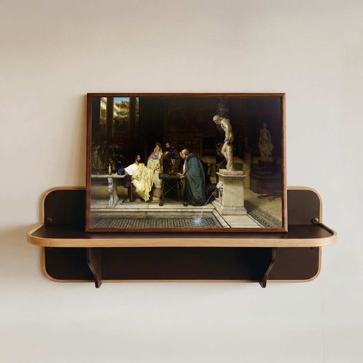 Framed art print of An Art Lover by Lawrence Alma-Tadema, in a dark wood frame resting on a wall shelf