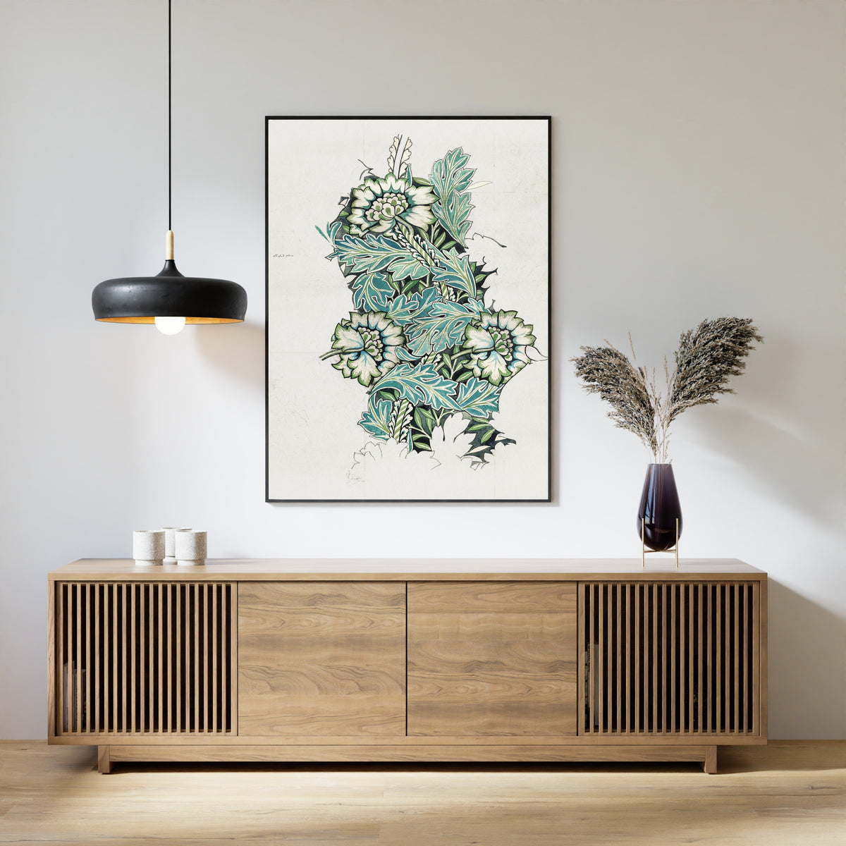 Framed art print of Anemone (Design Drawing) by William Morris, above a slatted wood sideboard