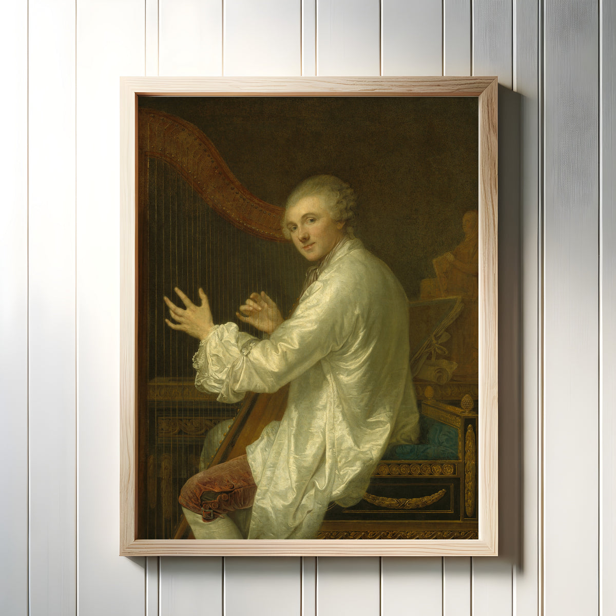 Framed art print of Ange Laurent de La Live de Jully by Jean-Baptiste Greuze, in a light wood frame on a white panelled wall