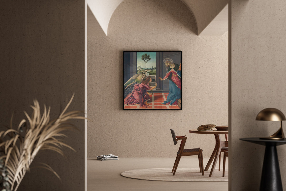 Framed art print of Annunciation by Sandro Botticelli, in a sunlit dining corner