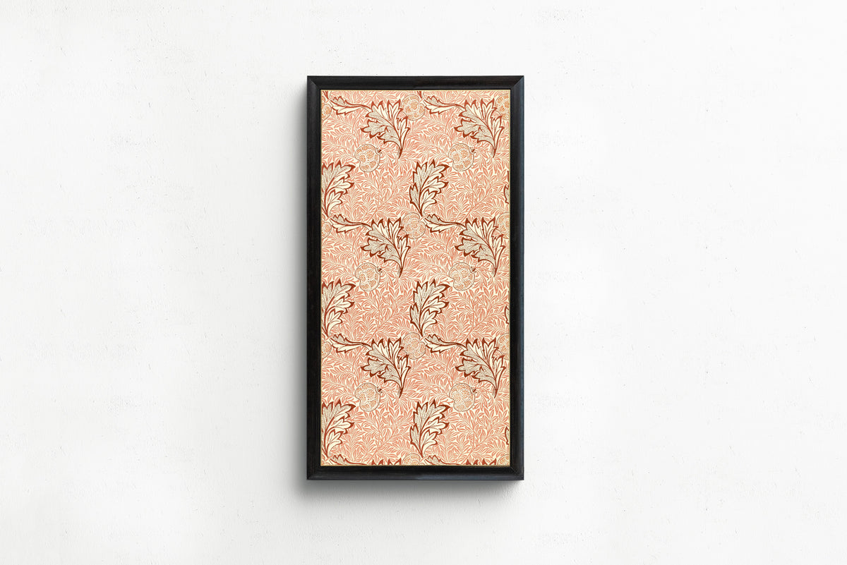 Framed art print of Apple by William Morris, in a slim black frame on a plain white wall