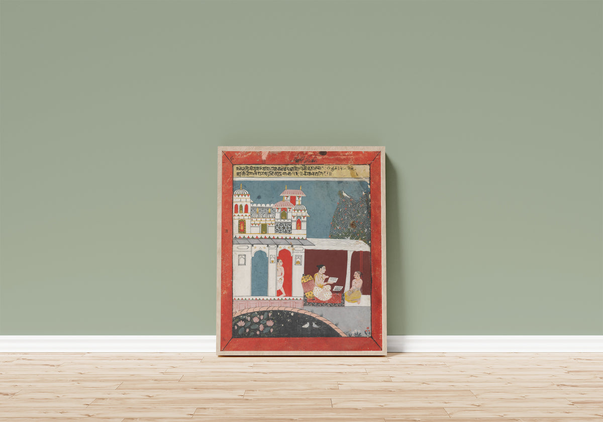Framed art print of Bangala Ragini by Malwa school, in a light wood frame leaning on a sage green wall above a wooden floor