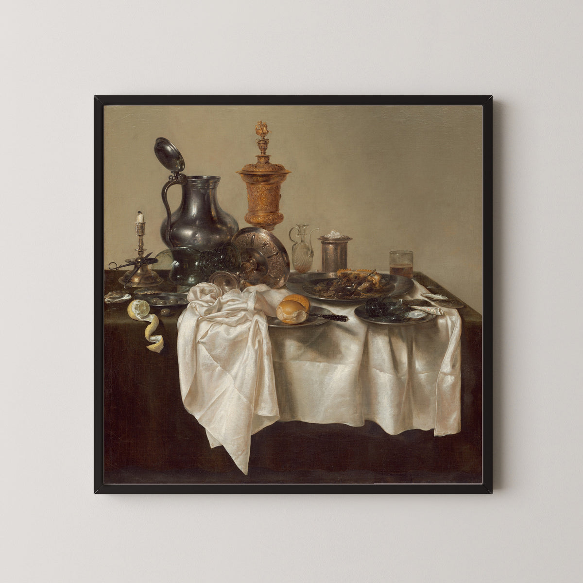 Banquet Piece with Mince Pie by Willem Claesz. Heda — in a black frame on a pale wall