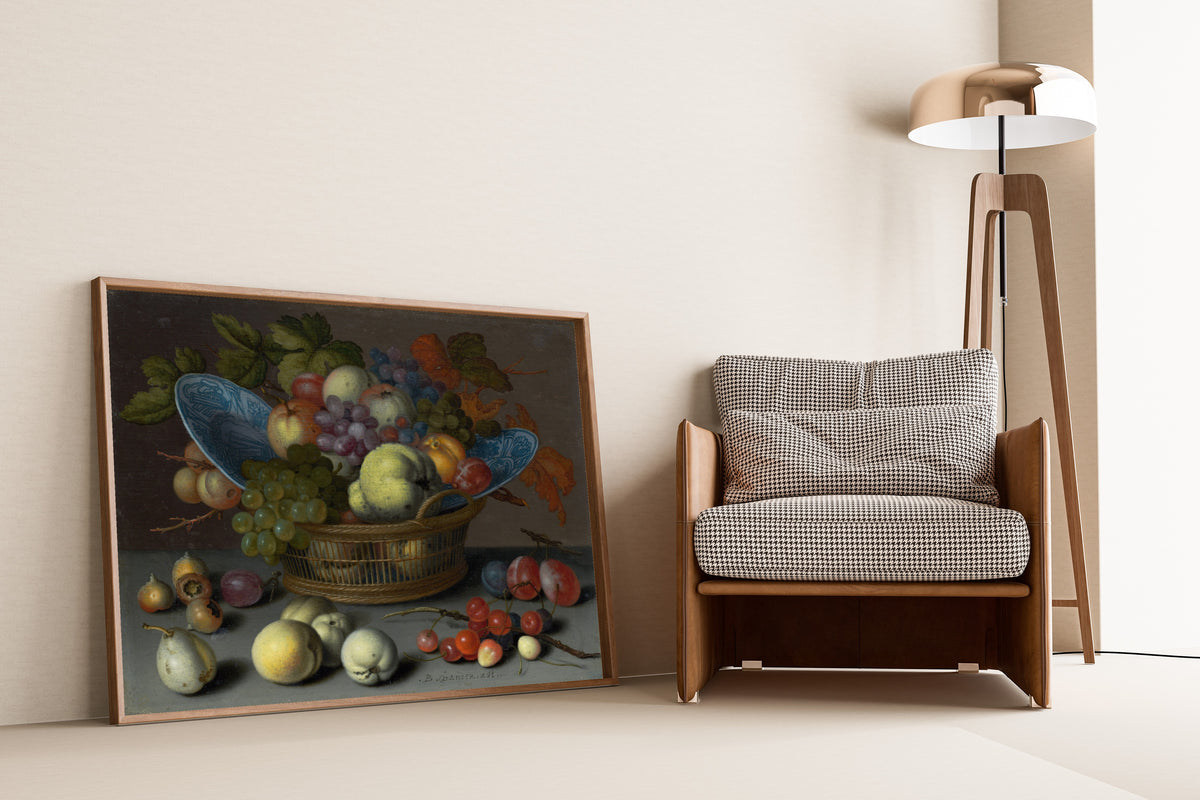 Basket of Fruits by Balthasar van der Ast — framed and leaning against a wall beside an armchair and a floor lamp