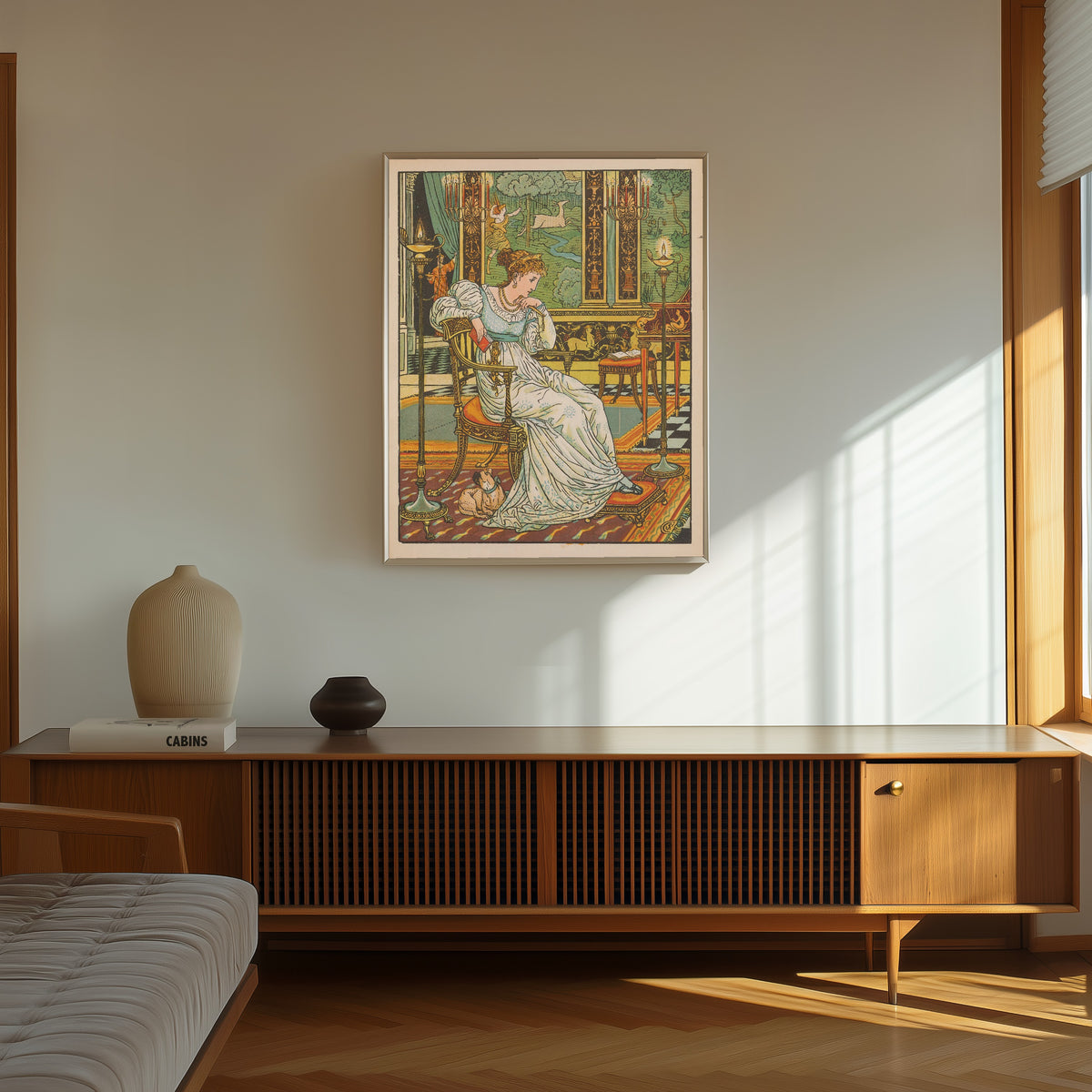 Framed art print of Beauty and the Beast: Plate 13 by Walter Crane, in a thin light frame on a sunlit wall above a wooden sideboard