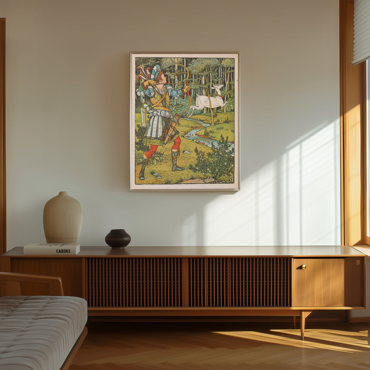 Framed art print of Beauty and the Beast: Plate 16 by Walter Crane, in a thin light frame on a sunlit wall above a wooden sideboard