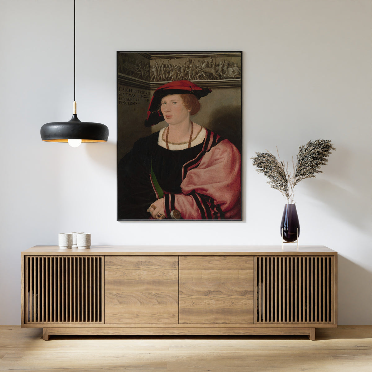 Framed art print of Benedikt von Hertenstein by Hans Holbein the Younger, above a slatted wood sideboard