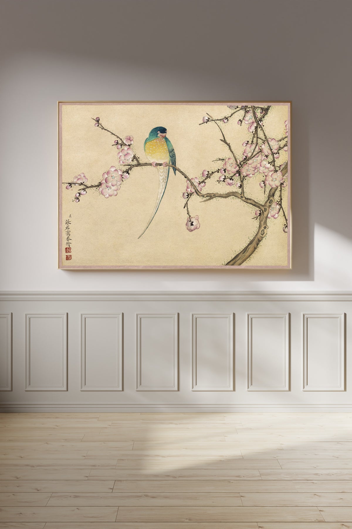 Desk Album: Flower and Bird Paintings (Bird with Plum Blossoms) by Zhang Ruoai — framed on a panelled wall in afternoon light