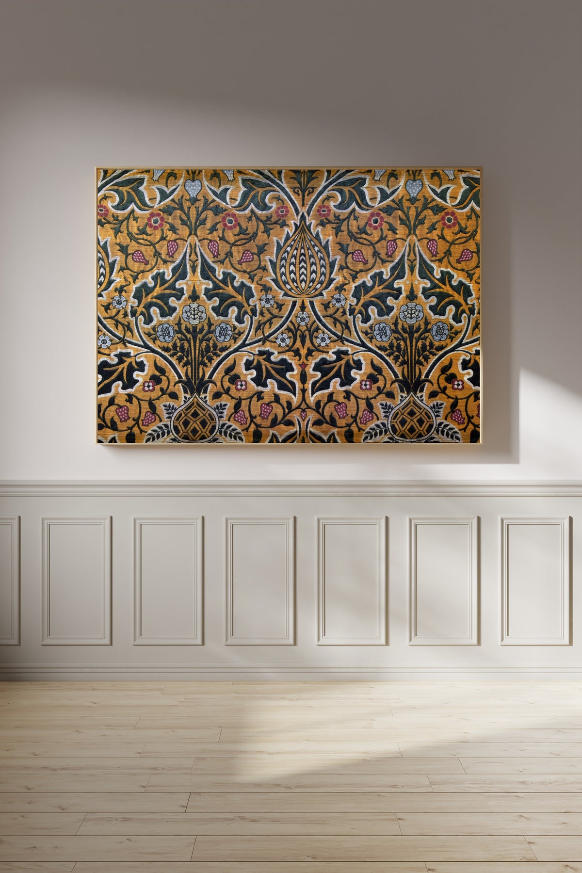 Framed art print of Brocatel by William Morris, on a panelled wall in afternoon light