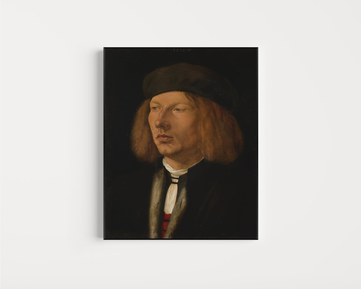Framed art print of Burkhard of Speyer by Albrecht Dürer, in a slim black frame on a plain white wall