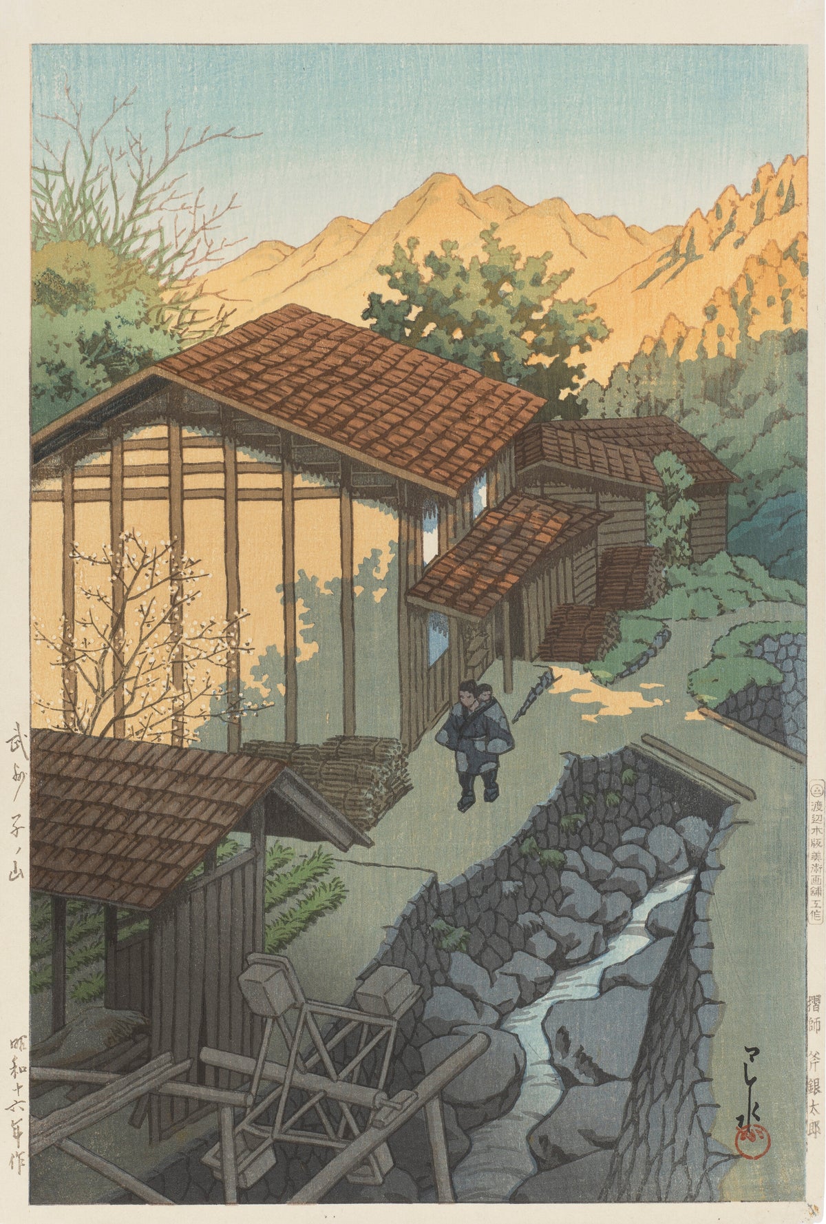 Bushu Nenoyama by Kawase Hasui — A hill village above a stone-lined stream, peaks glowing orange