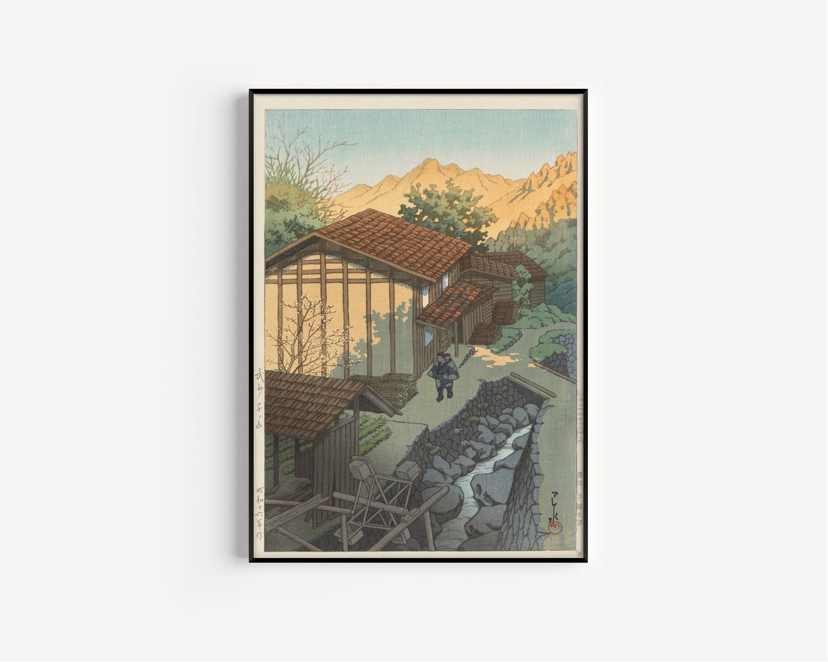 Framed art print of Bushu Nenoyama by Kawase Hasui, in a slim black frame on a plain white wall
