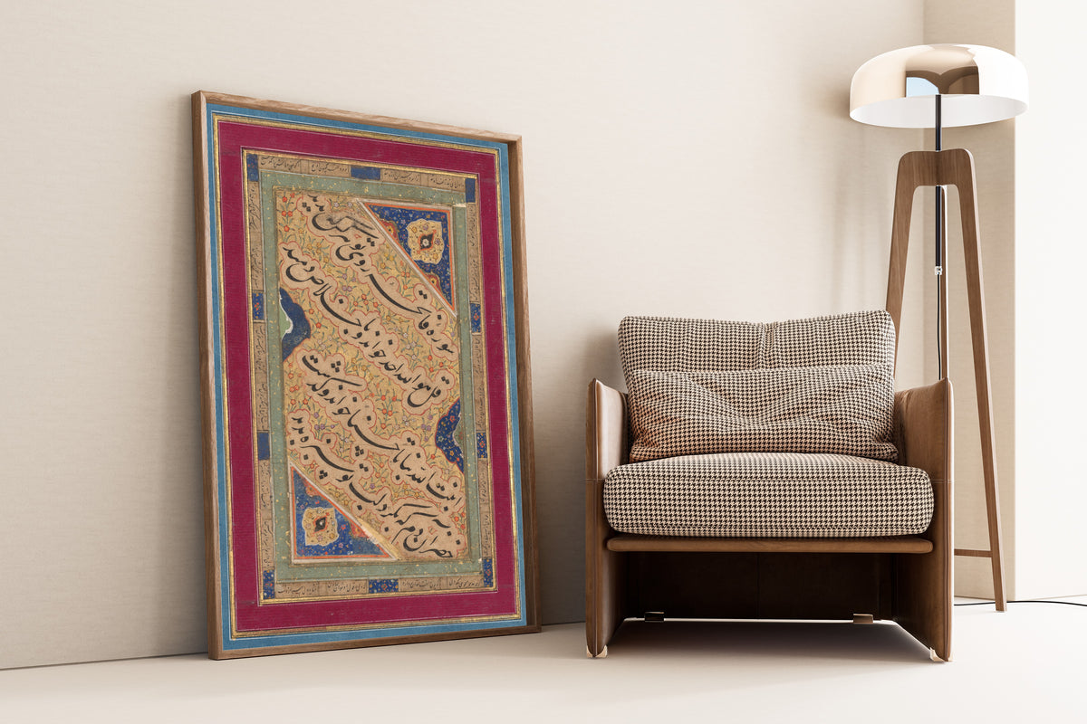 Framed art print of Calligraphy of Lyrical Quatrains, leaning against a wall beside an armchair and a floor lamp