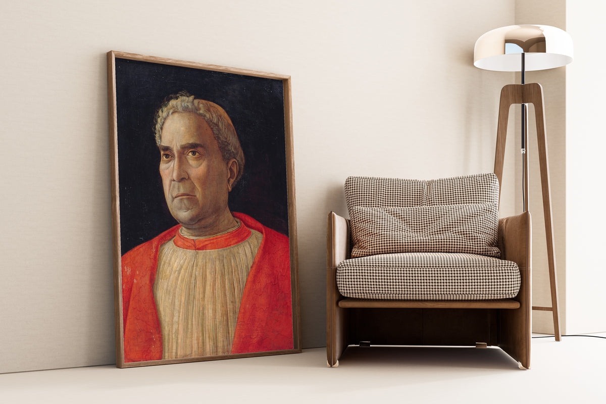 Framed art print of Cardinal Ludovico Scarampi Mezzarota called Ludovico… by Andrea Mantegna, leaning against a wall beside an armchair and a floor lamp