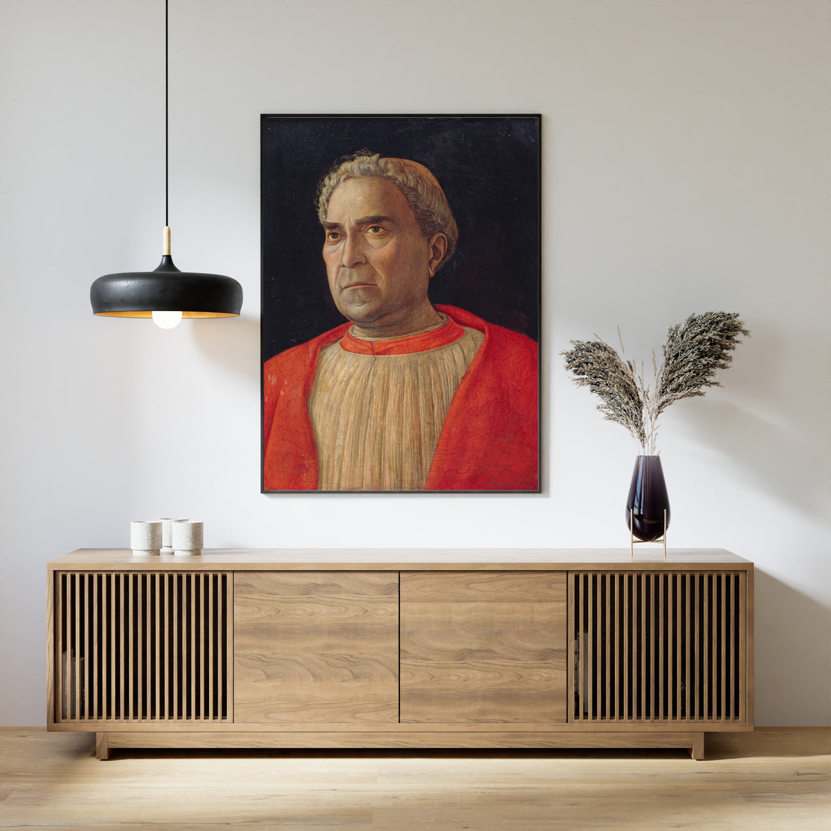 Framed art print of Cardinal Ludovico Scarampi Mezzarota called Ludovico Trevisano by Andrea Mantegna, above a slatted wood sideboard
