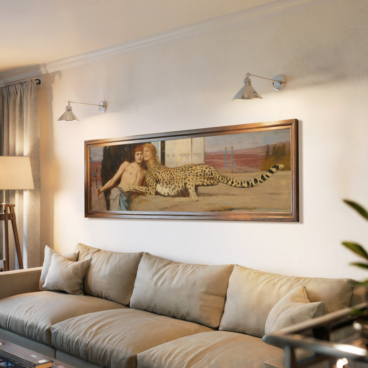 Framed art print of Caresses by Fernand Khnopff, above a long sofa with wall lights