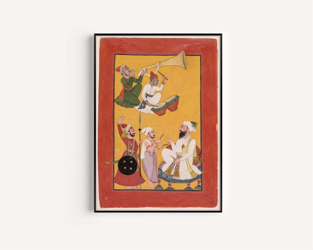Framed art print of Celebrations of Krishna's Birth, from a Bhagavata Purana by Pahari school, in a slim black frame on a plain white wall