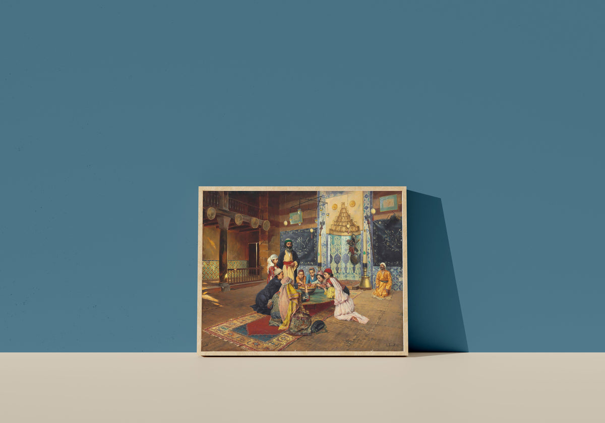 Framed art print of Charity among Dervishes at Scutari by Rudolf Ernst, in a light wood frame leaning on a blue wall