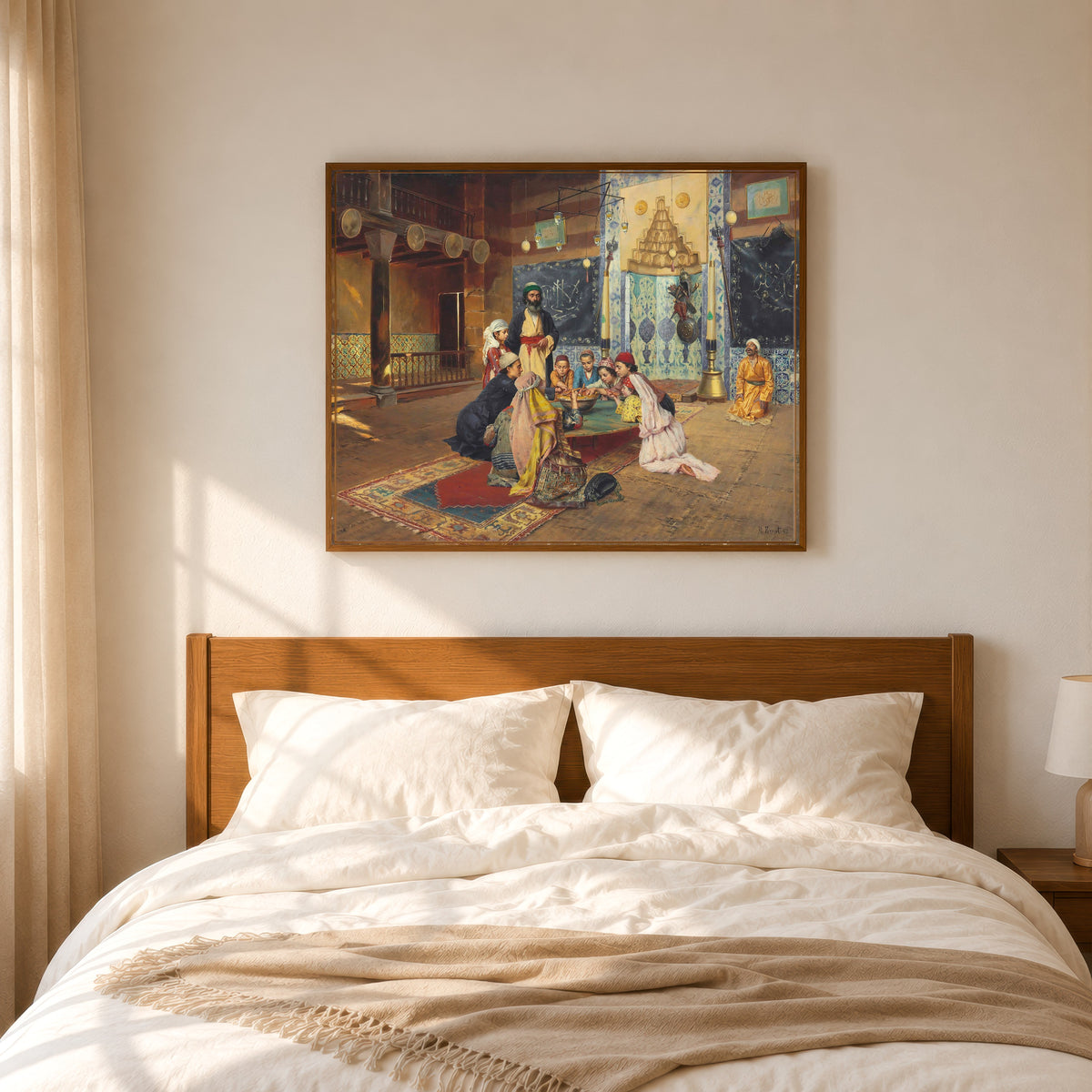 Framed art print of Charity among Dervishes at Scutari by Rudolf Ernst, in a slim wood frame above a bed in a sunlit bedroom