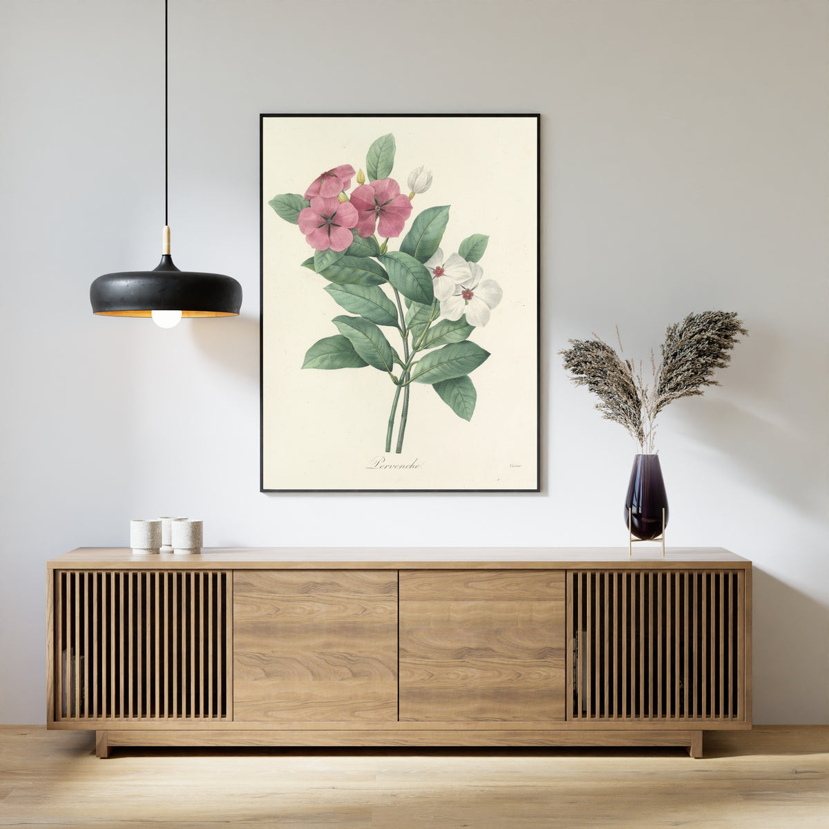 Framed art print of Choix des plus belles fleurs, Plate 68: Pervenche by Pierre-Joseph Redouté, above a slatted wood sideboard