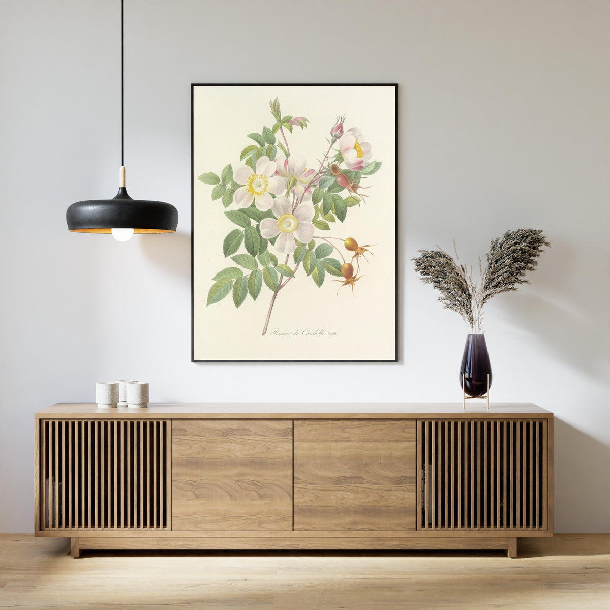 Framed art print of Choix des plus belles fleurs, Plate 98: Rosier de Candolle, Variété by Pierre-Joseph Redouté, above a slatted wood sideboard