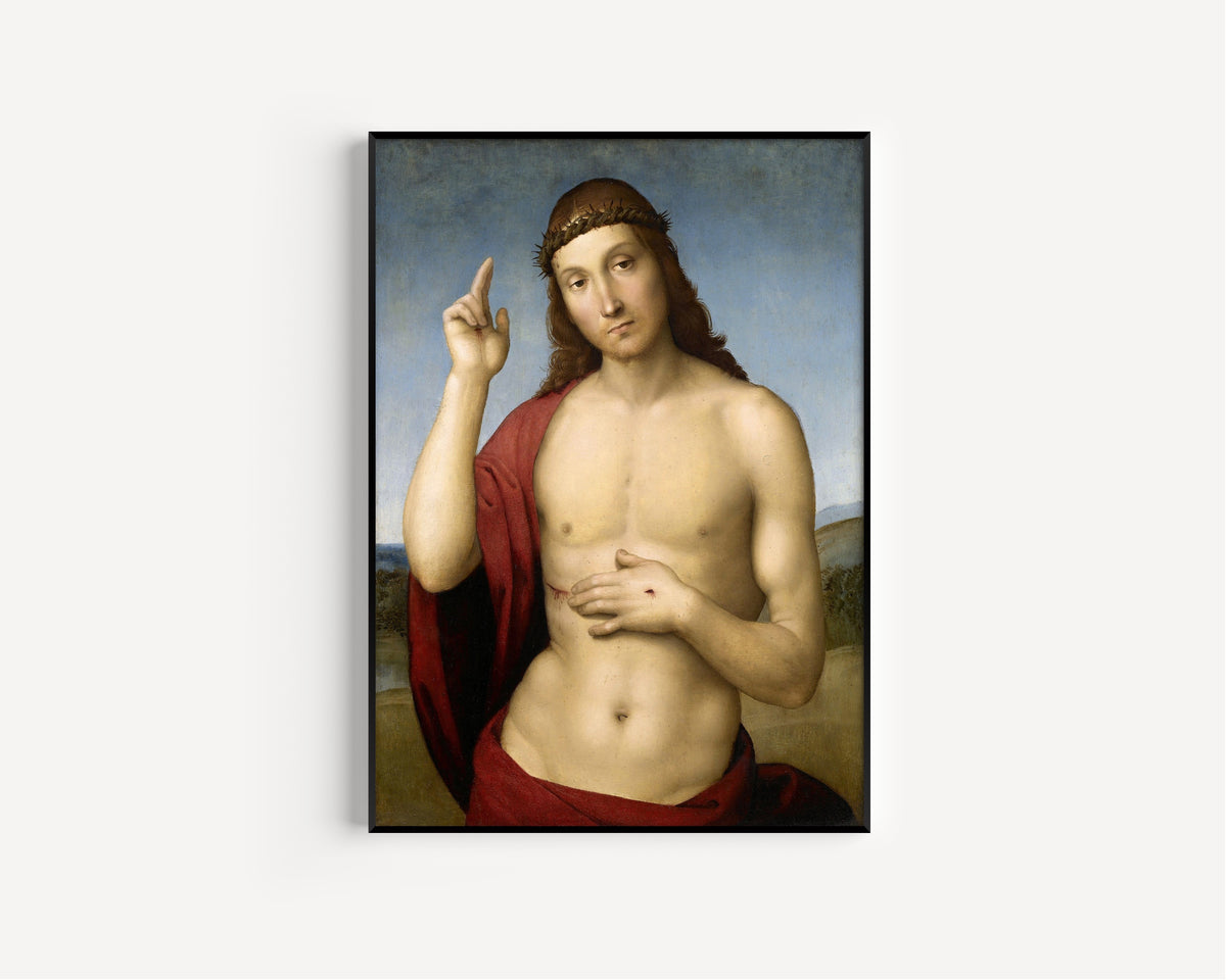 Framed art print of Christ Blessing (Pax Vobiscum) by Raphael, in a slim black frame on a plain white wall