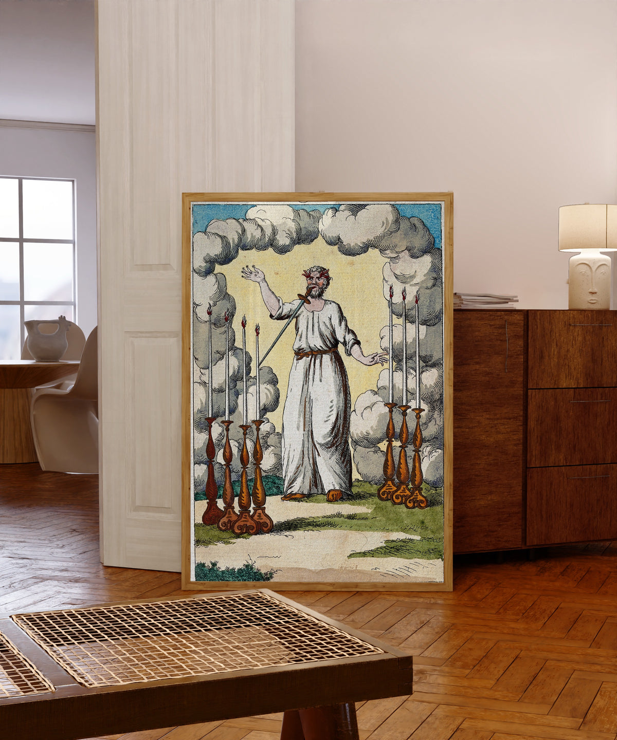 Framed art print of Christ with a Sword in His Mouth between Seven… by After Nicolas Flamel, in a light wood frame leaning in a warm room with a parquet floor