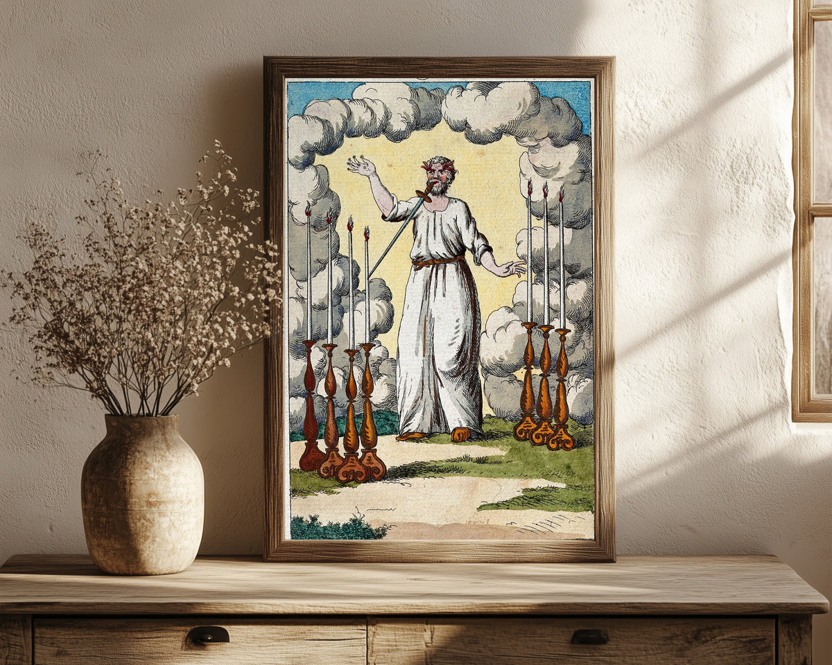 Framed art print of Christ with a Sword in His Mouth between… by After Nicolas Flamel, in a dark wood frame leaning on a rustic console beside dried flowers
