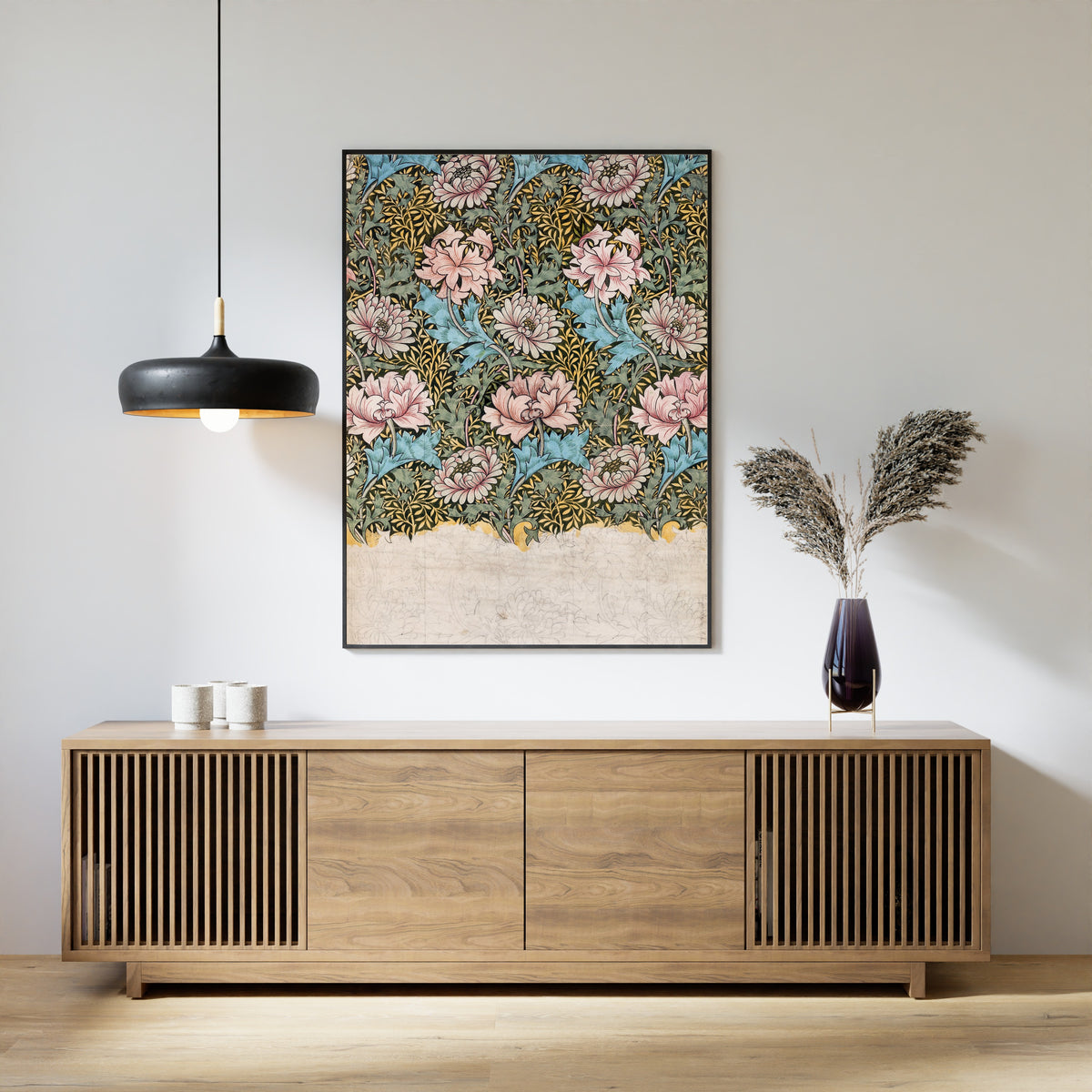 Framed art print of Chrysanthemum (Design Drawing) by William Morris, above a slatted wood sideboard