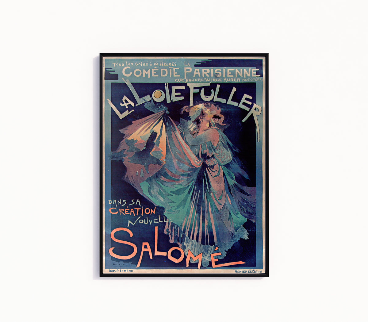 Framed art print of Comédie Parisienne: La Loïe Fuller dans sa création nouvelle, Salomé by Georges de Feure, in a slim black frame on a plain white wall