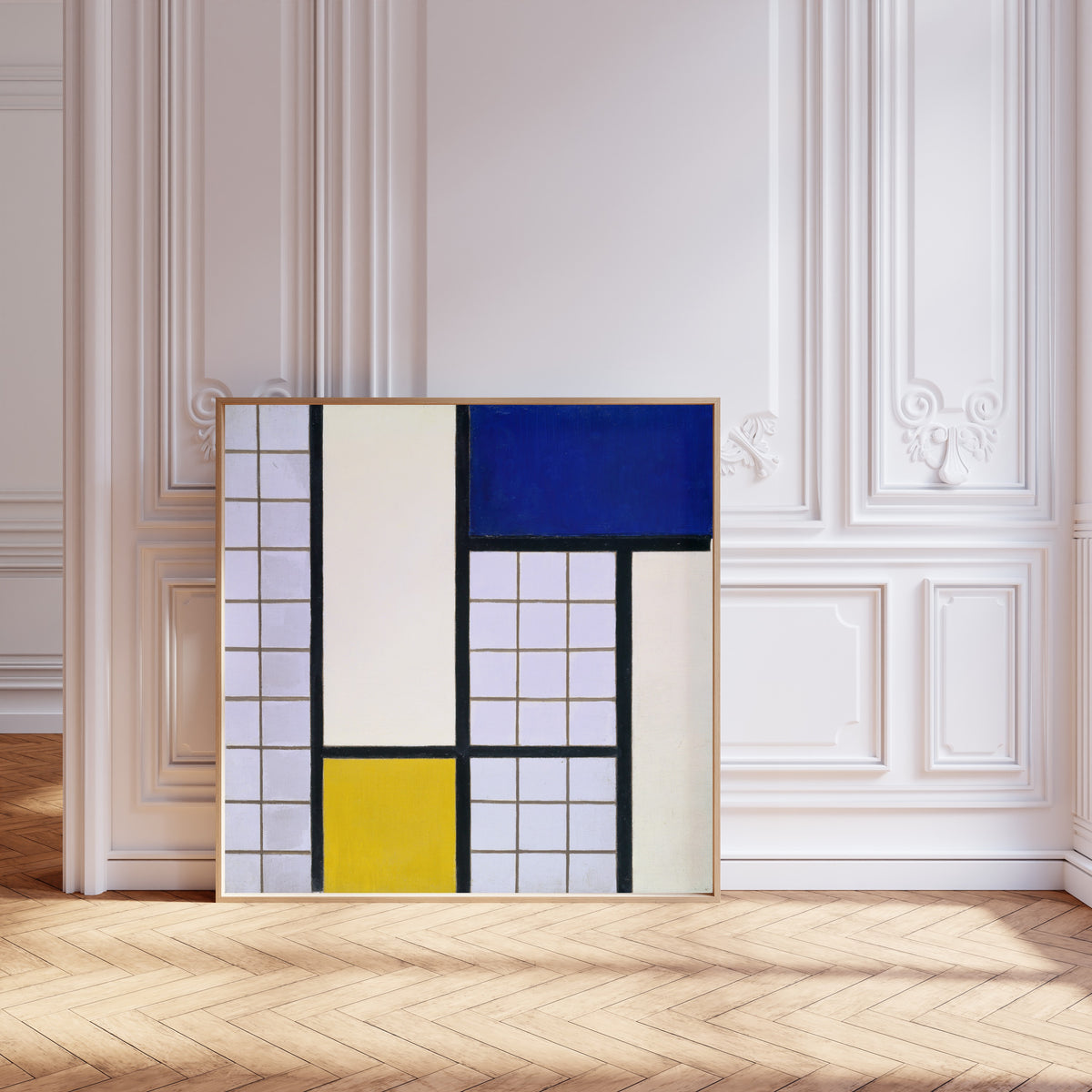 Framed art print of Composition in Half-Tones by Theo van Doesburg, leaning against pale pink panelling on a herringbone floor