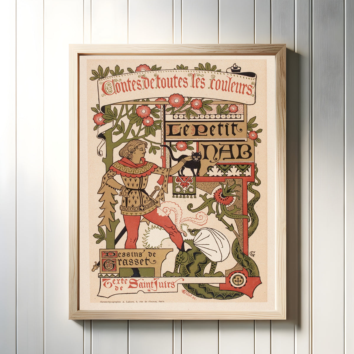 Framed art print of Contes de toutes les couleurs Le Petit Nab by Eugène Grasset, in a light wood frame on a white panelled wall