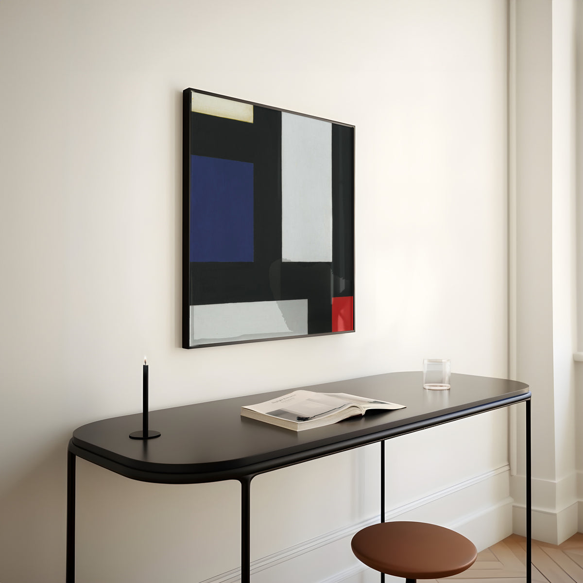 Framed art print of Contra-composition IV by Theo van Doesburg, above a slim black console table