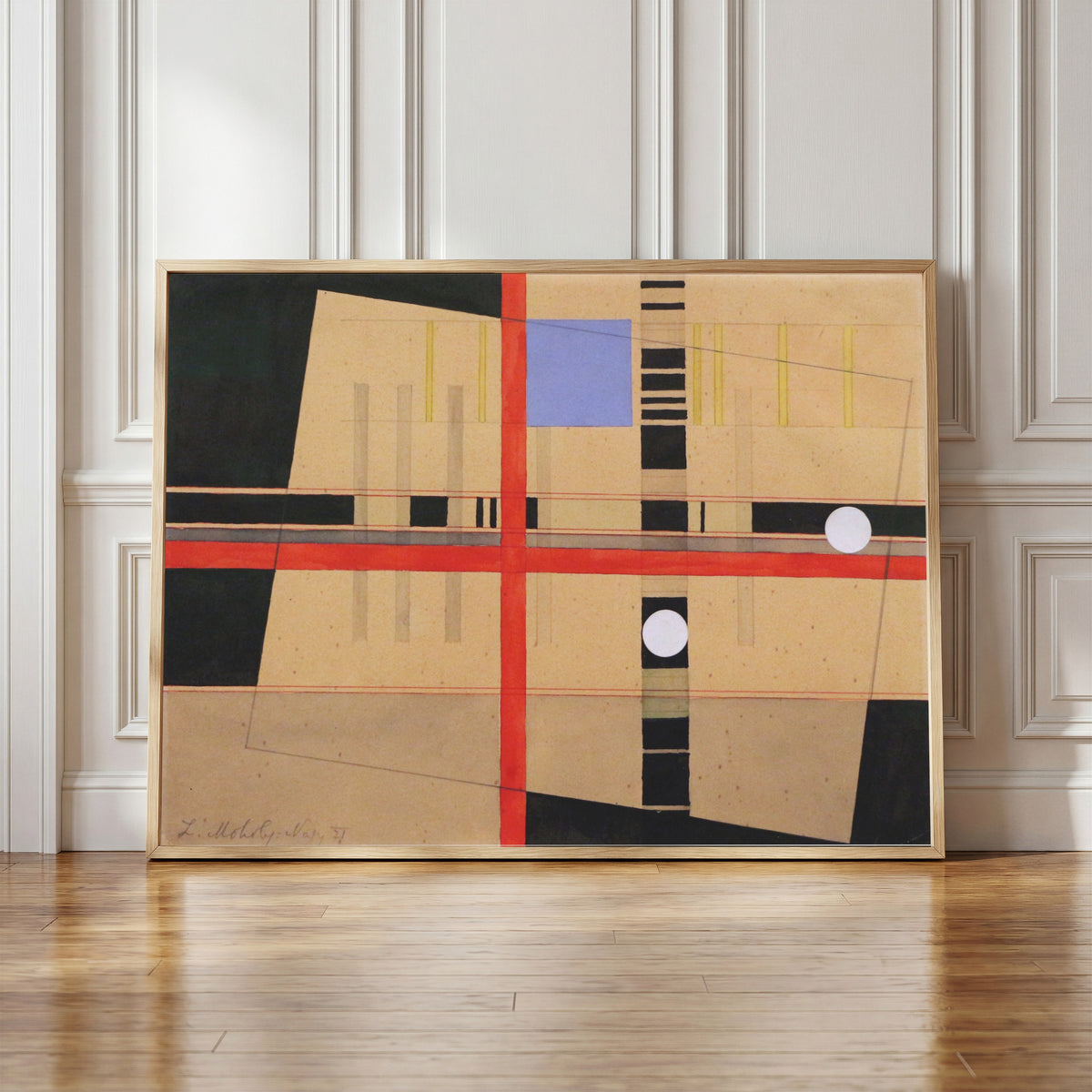 Framed art print of Croce rossa e palle bianche by László Moholy-Nagy, in a light wood frame leaning against a panelled white wall