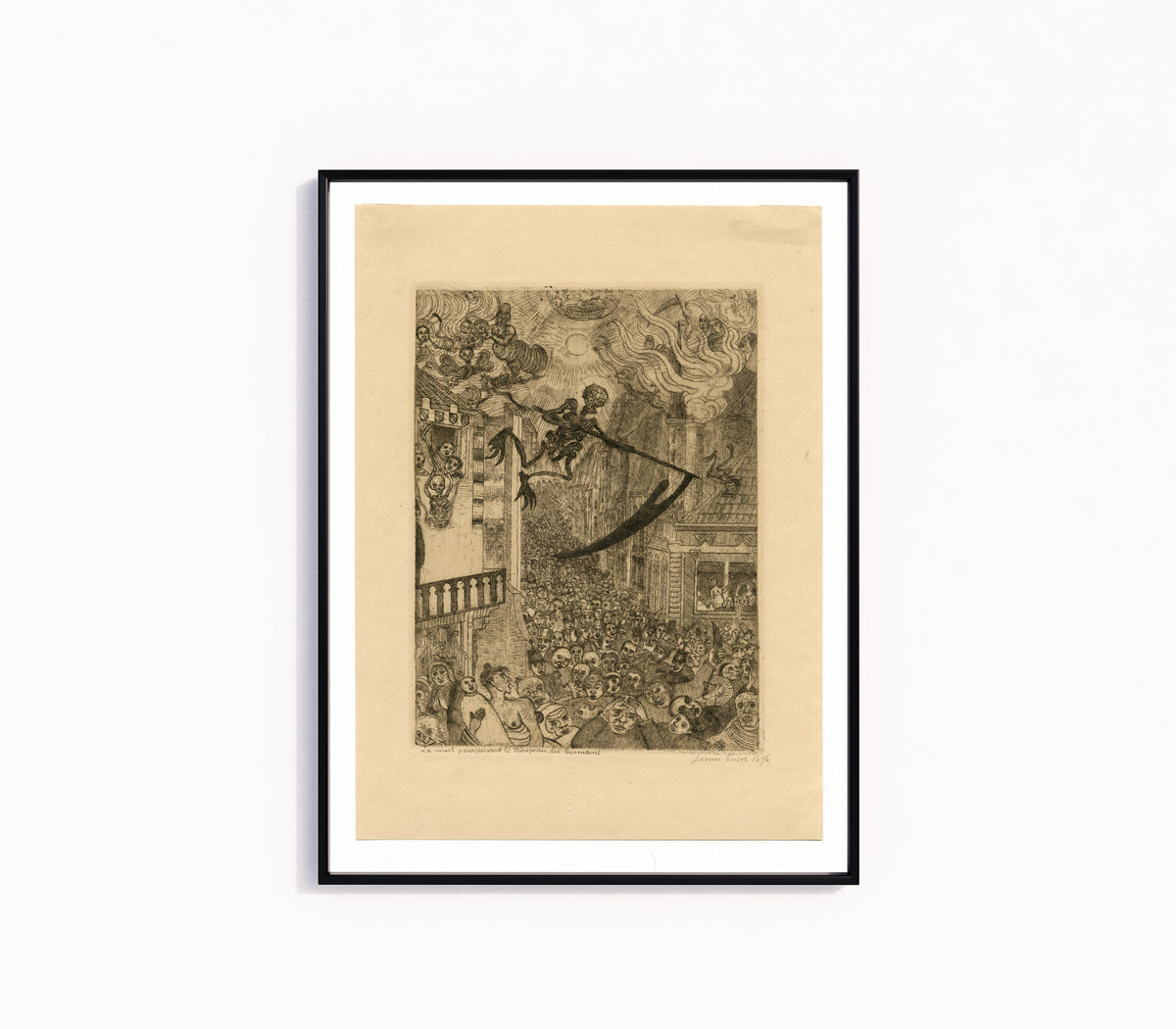 Framed art print of Death Pursuing the Human Herd (La mort poursuivant le troupeau des humains) by James Ensor, in a slim black frame on a plain white wall