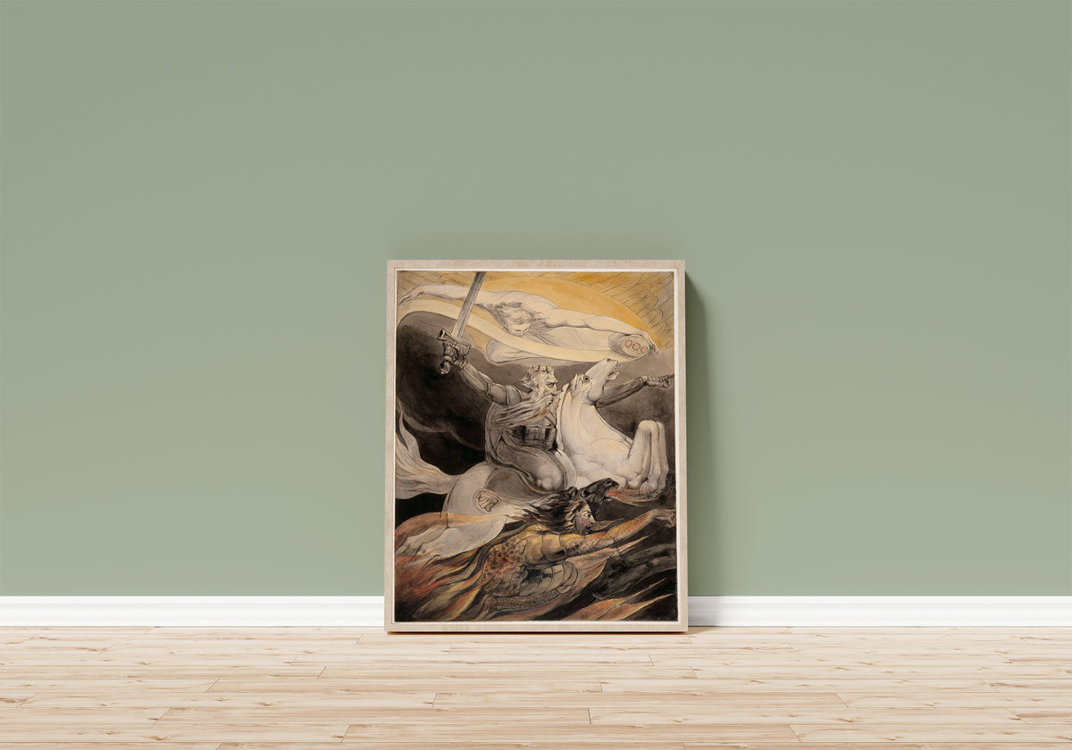 Framed art print of Death on a Pale Horse by William Blake, in a light wood frame leaning on a sage green wall above a wooden floor