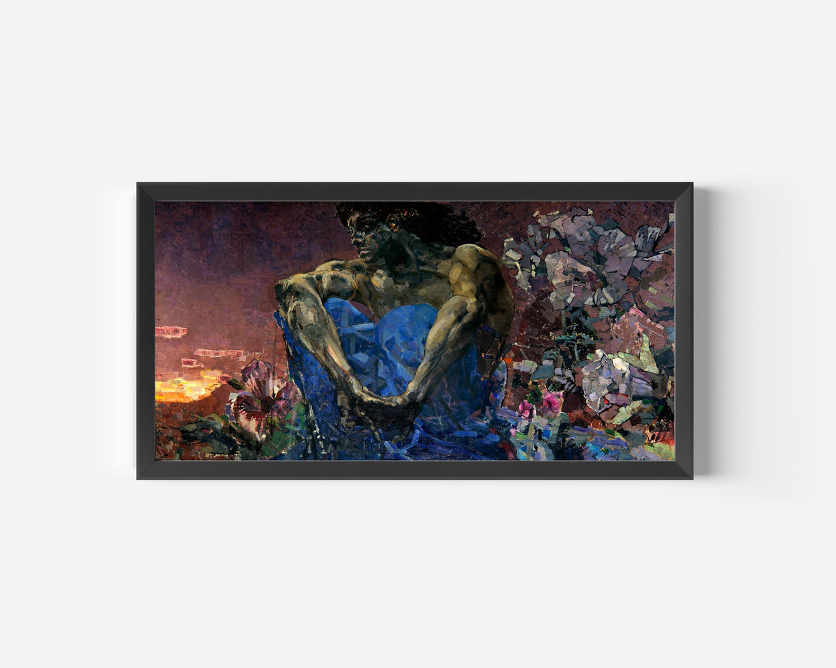 Framed art print of Demon Seated by Mikhail Vrubel, in a wide black frame on a plain white wall