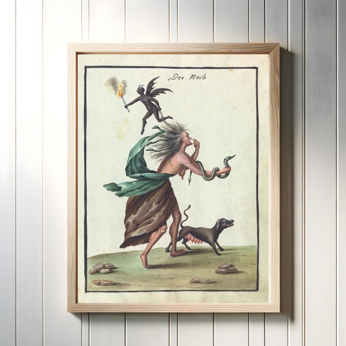 Framed art print of Der Neid by Unknown artist, in a light wood frame on a white panelled wall
