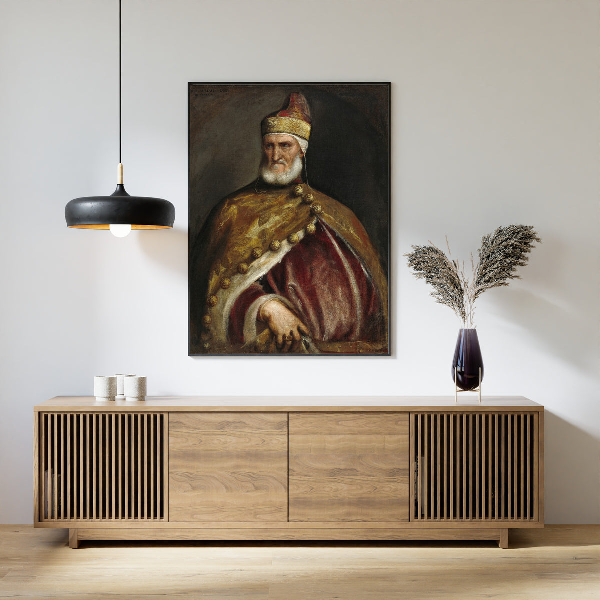 Framed art print of Doge Andrea Gritti by Titian, above a slatted wood sideboard