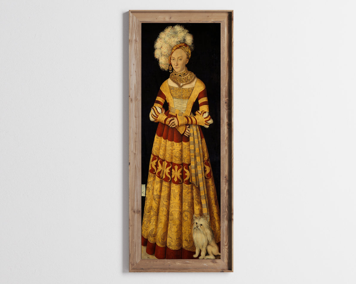 Framed art print of Duchess Katharina von Mecklenburg by Lucas Cranach the Elder, in a tall wooden frame on a pale wall